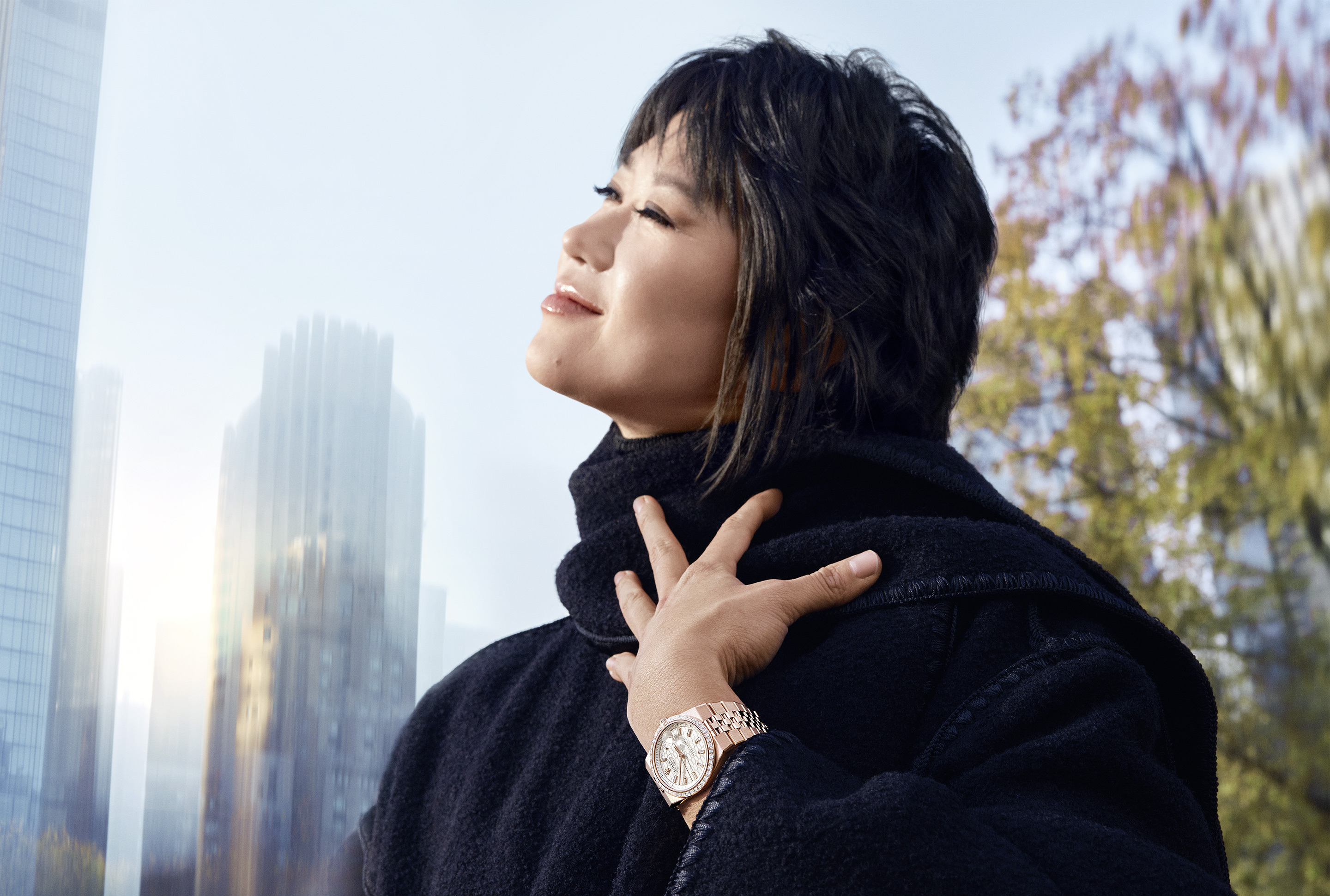 Rolex Testimonee Yuja Wang wearing a Land-Dweller watch in a city setting - AH Riise US Virgin Islands Rolex Testimonee Yuja Wang wearing a Land-Dweller watch in a city setting - AH Riise US Virgin Islands